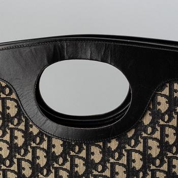 Christian Dior, Oblique fold-over convertible clutch.