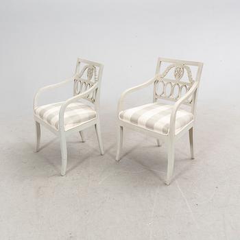 A pair of gustavian style chairs, circa 1900.
