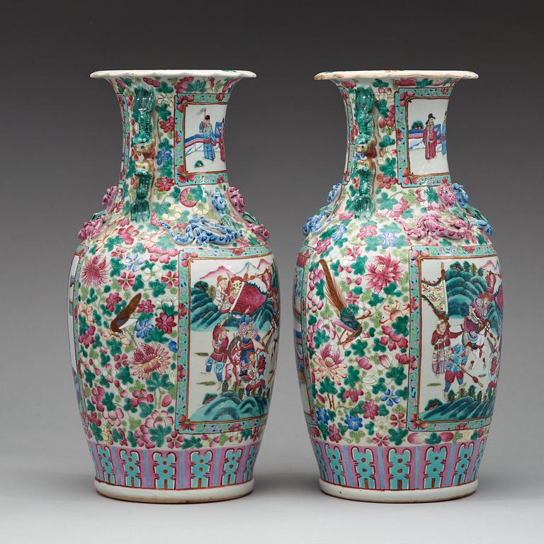 A pair of Canton famille rose vases, Qing dynasty, 19th Century.