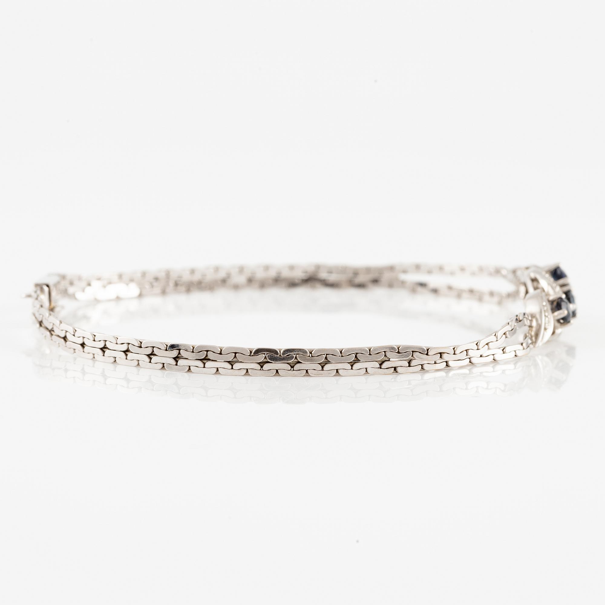 Arm bracelet, 18K white gold with small octagon-cut diamonds and sapphires.