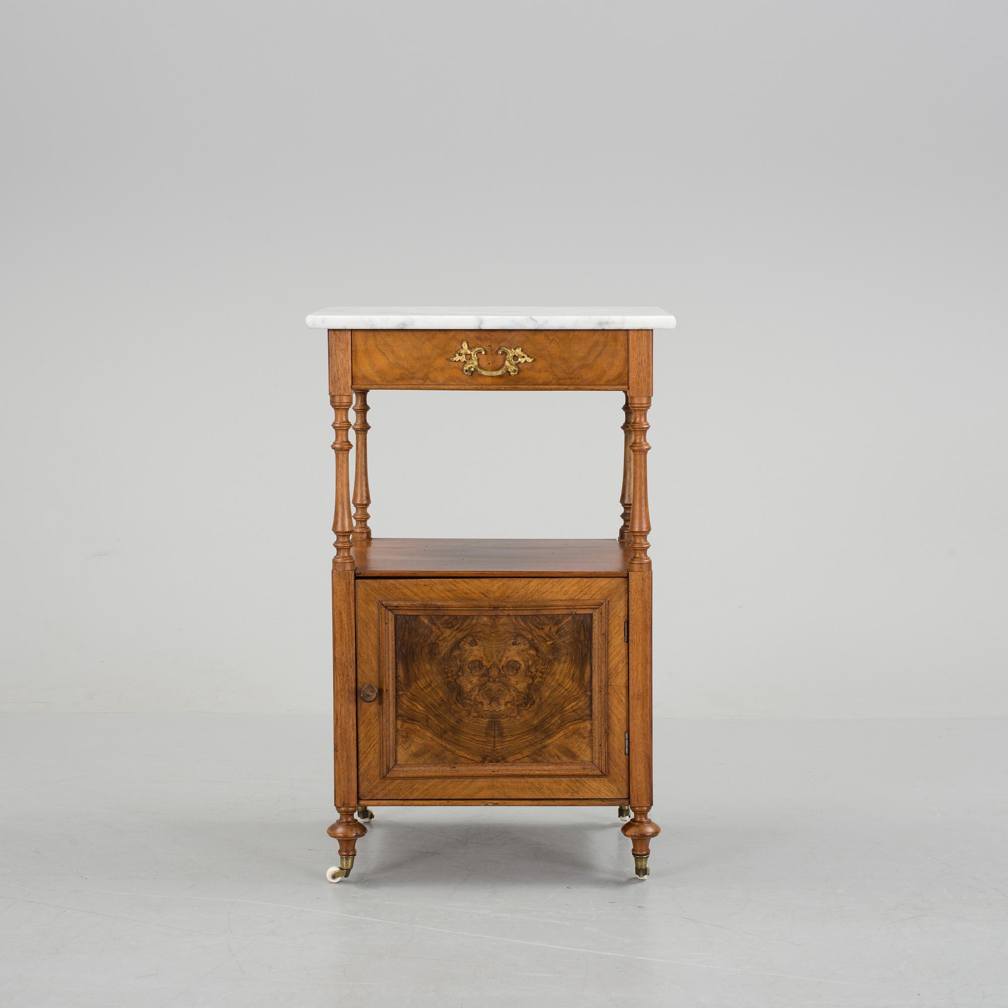 A walnut and mahogany bedside table, late 19th Century.