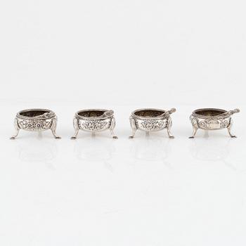 A set of four silver salt-cellars with silver spoons. Mark of Martin Hall & Company, Ltd, Sheffield 1870-71.