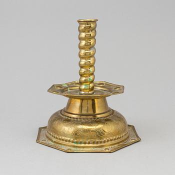 A 18th century Baroque brass candlestick.