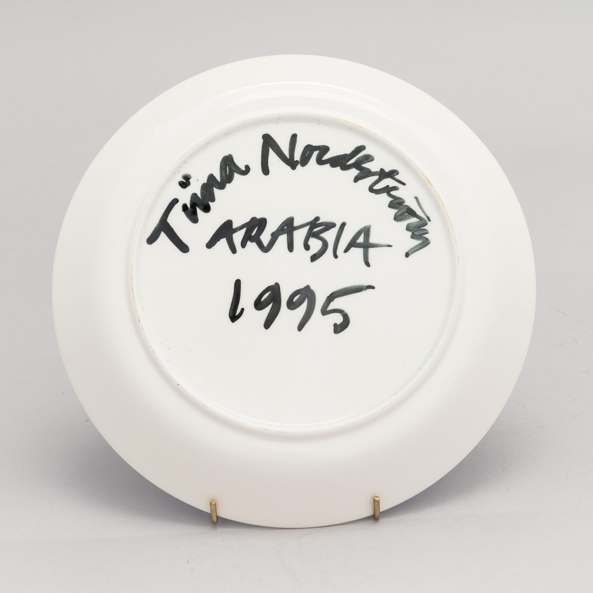 Tiina Nordström, a porcelain decorative plate, signed Tiina Nordström Arabia 1995.