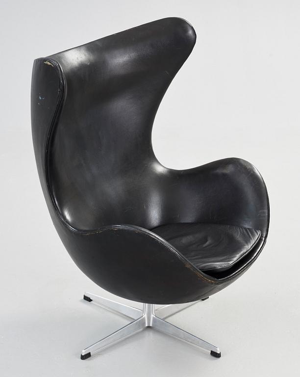 An Arne Jacobsen black leather 'Egg Chair', Fritz Hansen, Denmark 1964.