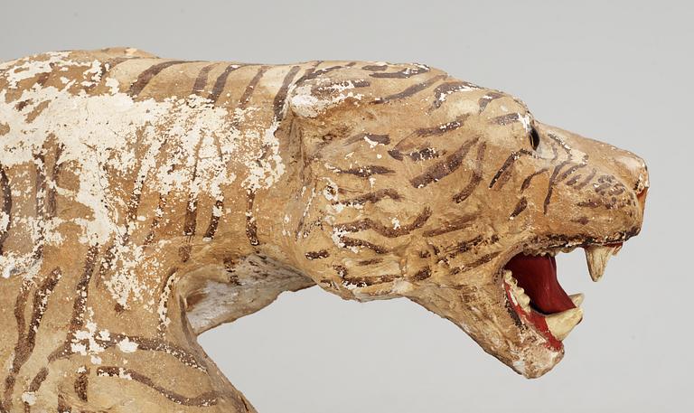 An early 20th cent papier-maché tiger.