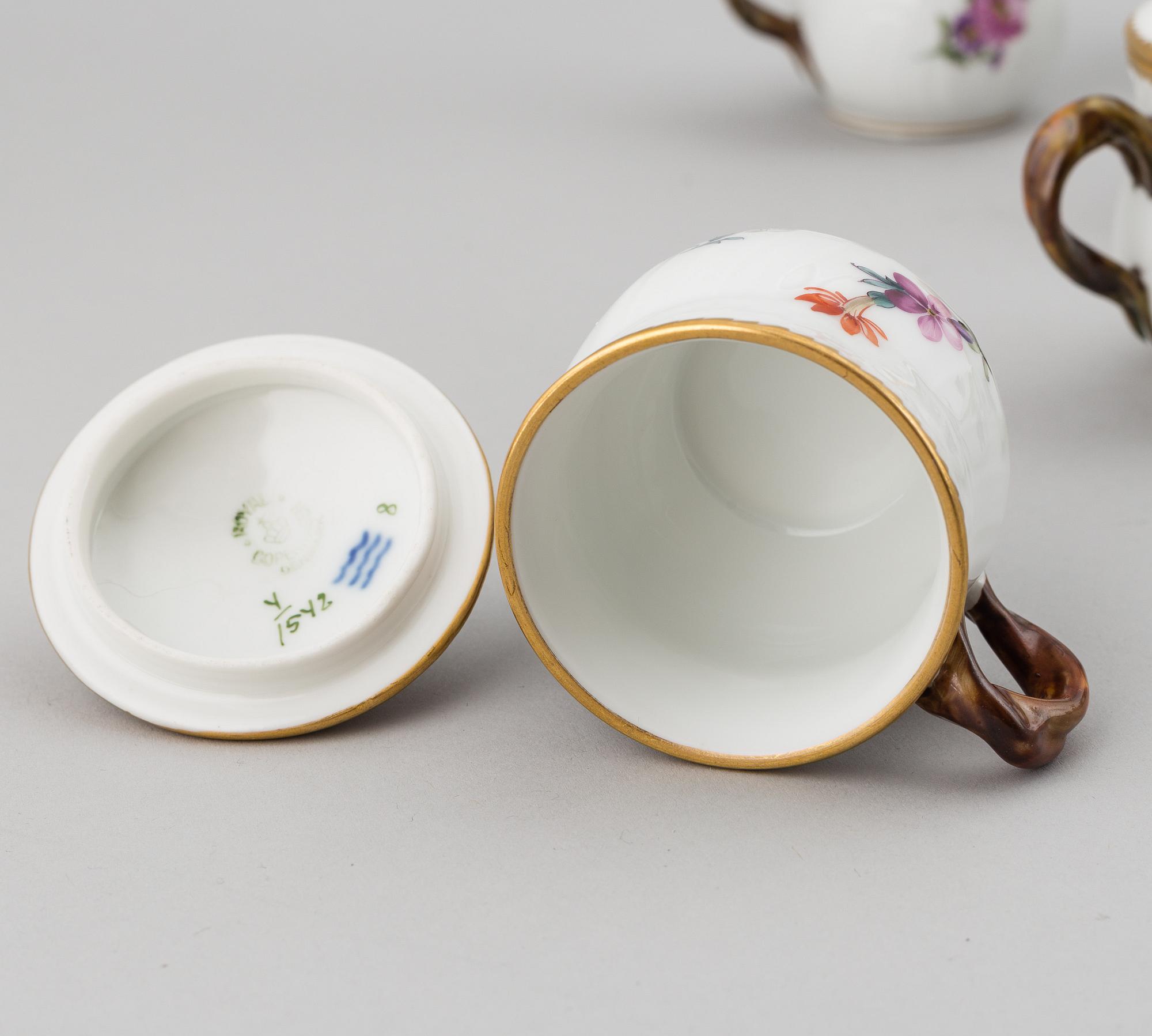 A set of 16 Royal Copenhagen custard cups with covers, Denmark, 20th Century.