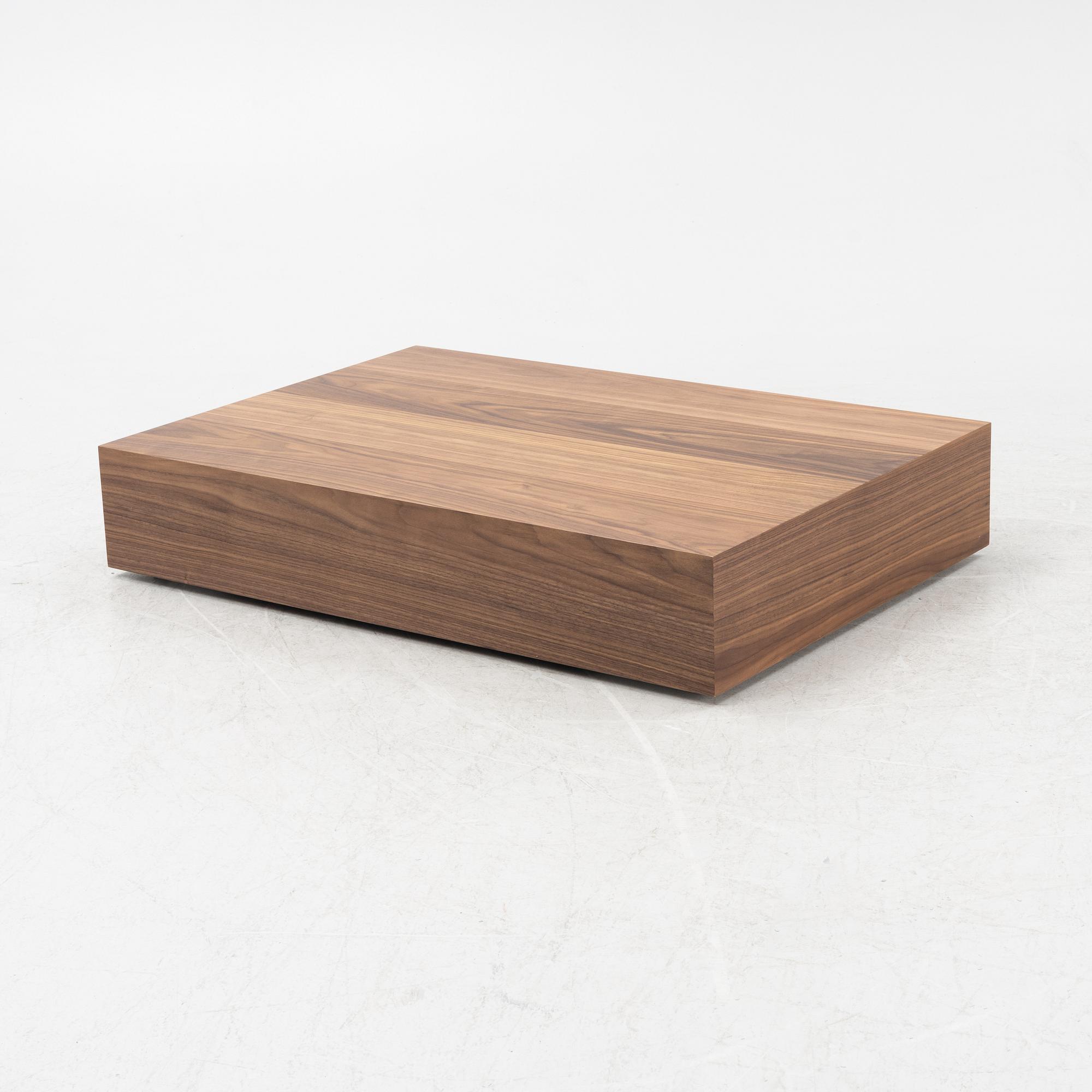 A 'Mass Wide' walnut veneered coffee table from New Works.