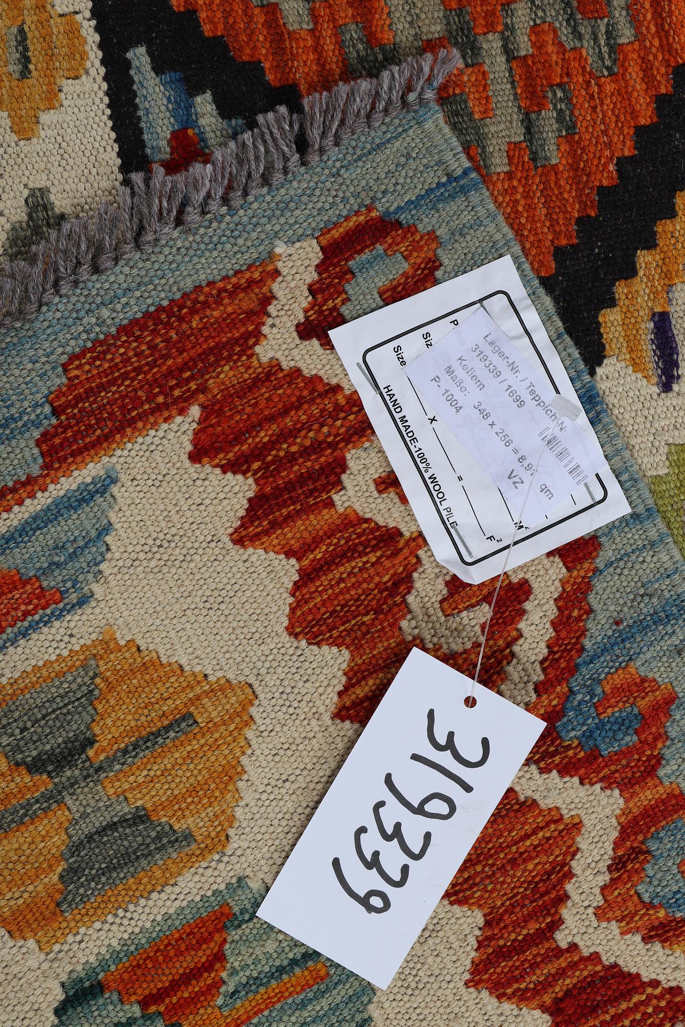 A carpet, kilim 343 x 250 cm.