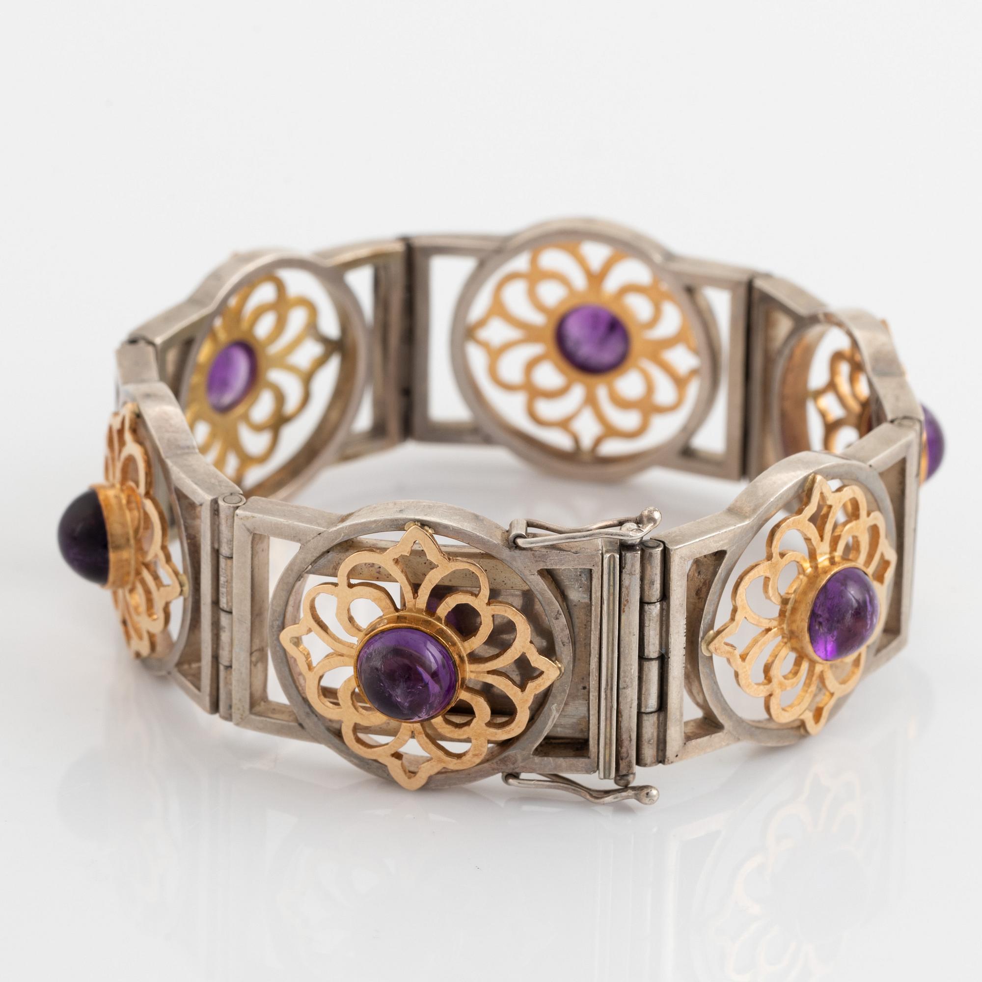 Silver and 18K gold with cabochon cut amethyst necklace.