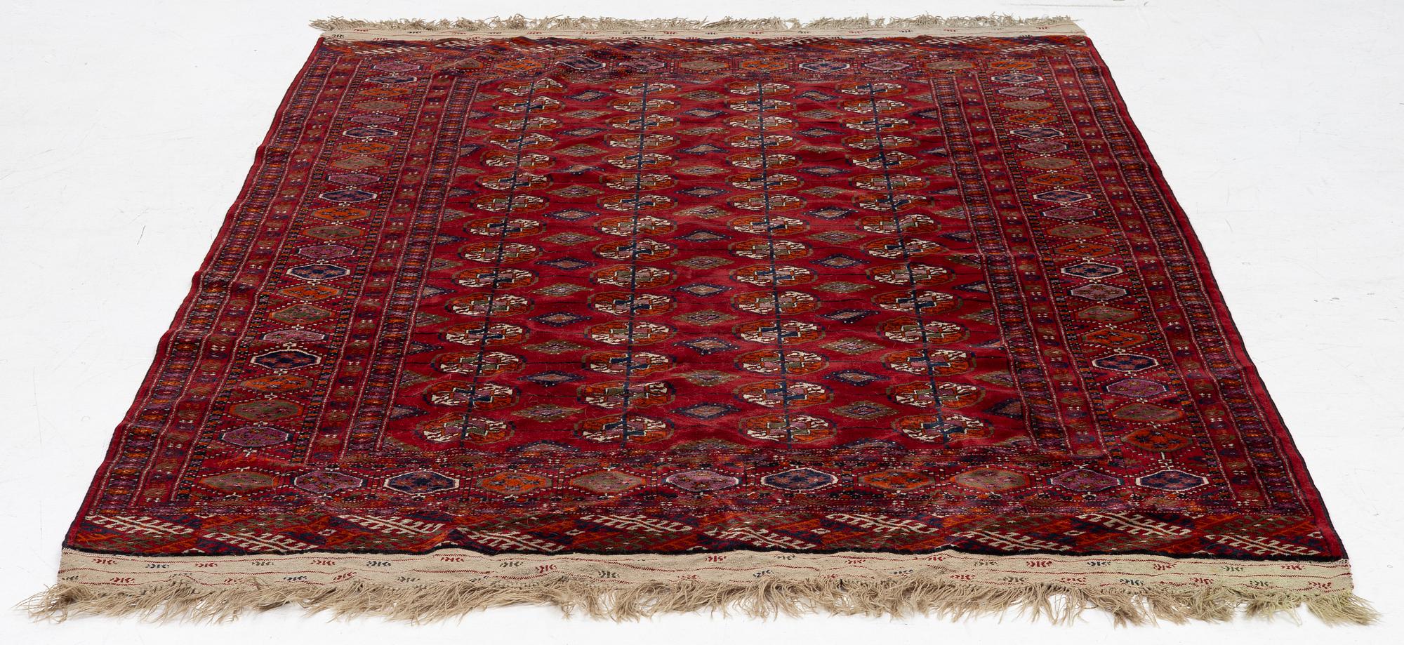 An old Turkmen carpet, c. 235 x 175 cm.