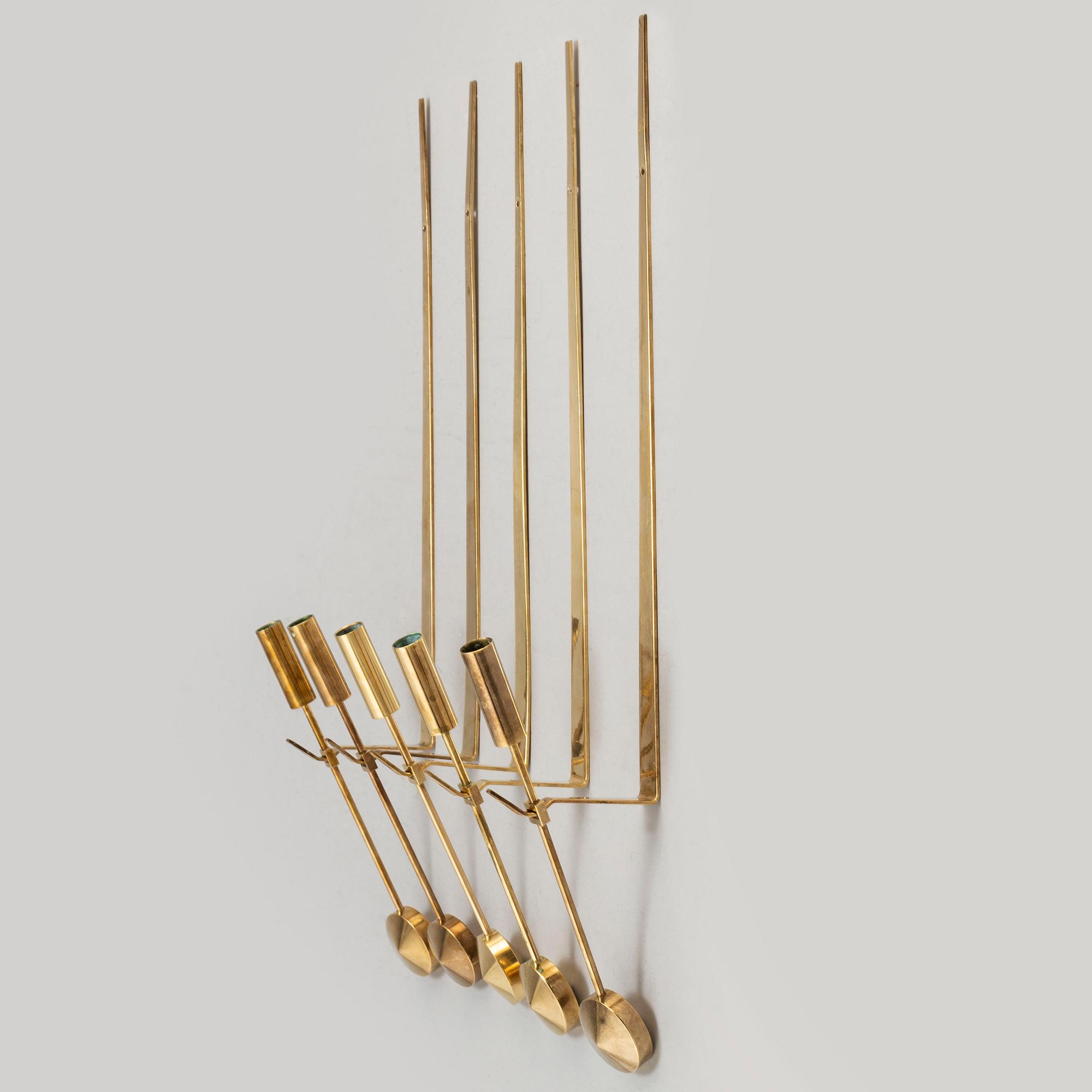 A pair of 'Pendel' wall scones by Pierre Forsell for Skultuna.
