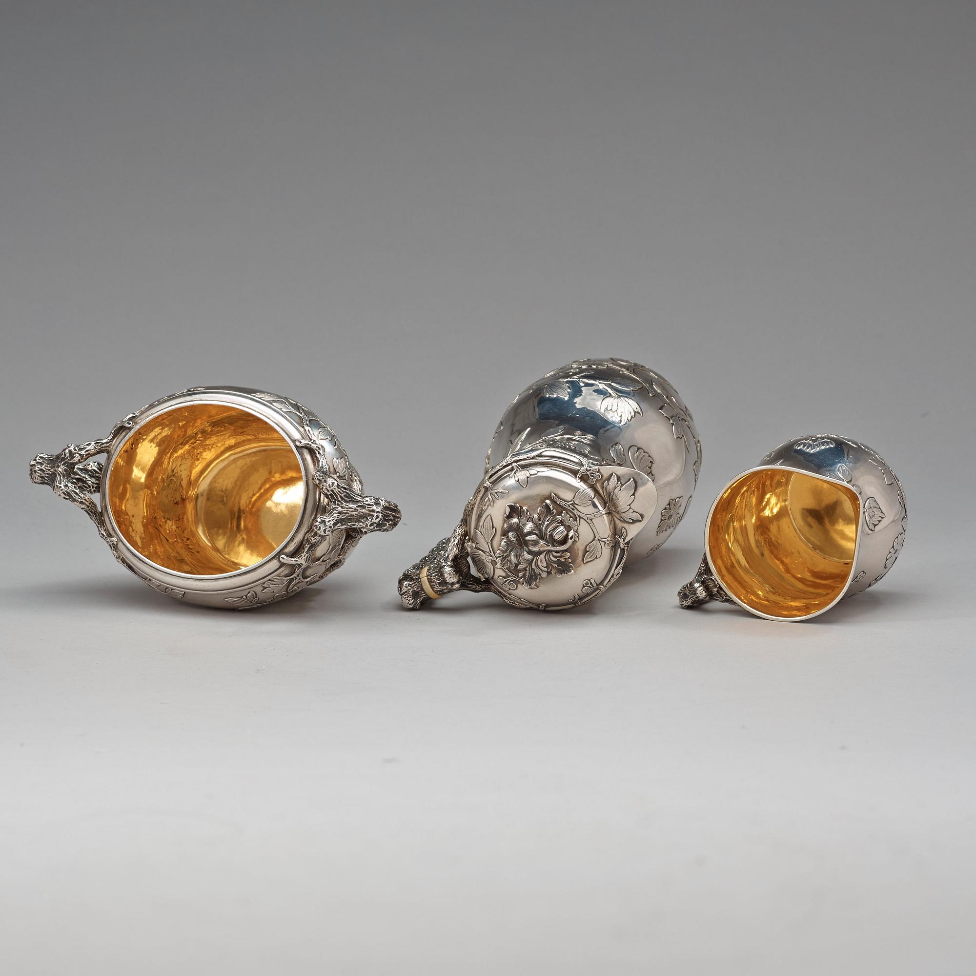 A Swedish 19th century parcel-gilt four piece coffée-set, makers mark of Gustaf Möllenborg, Stockholm 1849.