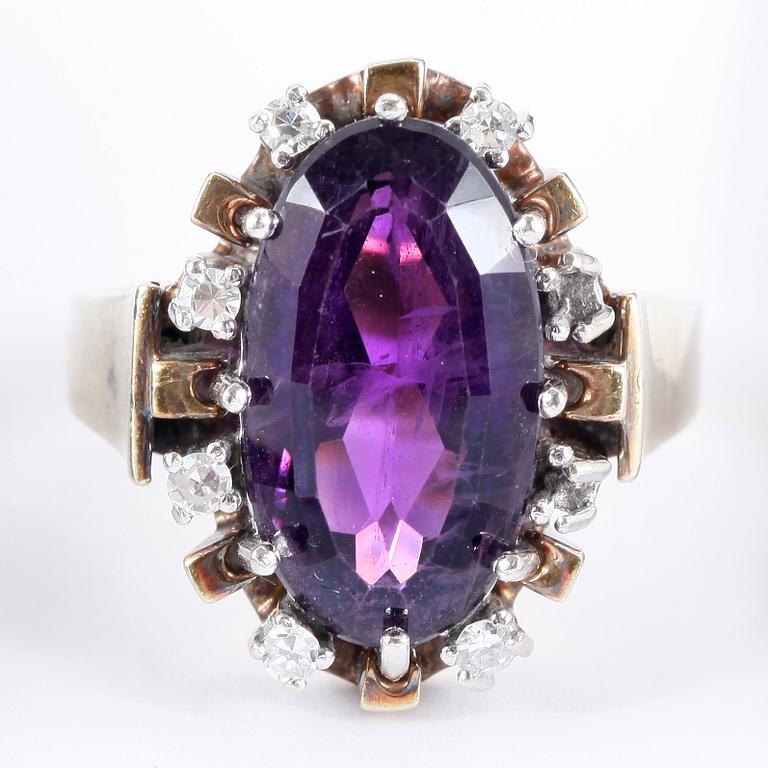 RING, 14k guld, lila sten samt briljanter. Vikt tot  ca 7.8 g.