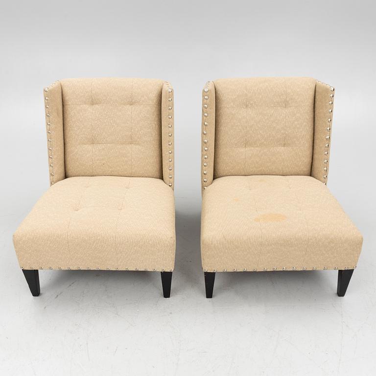 A pair of 'Triton custom chair' lounge chairs, Andrew & Martin, England, 21st century.