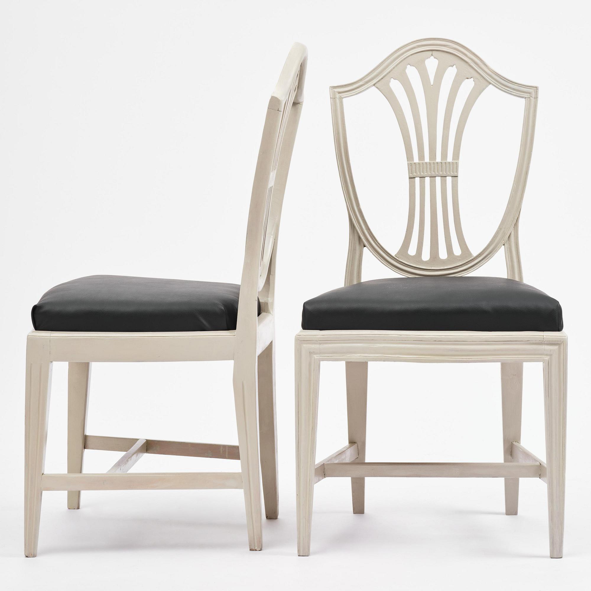 A set of eight late Gustavian chairs by J. E. Höglander (master in Stockholm 1777-1813).