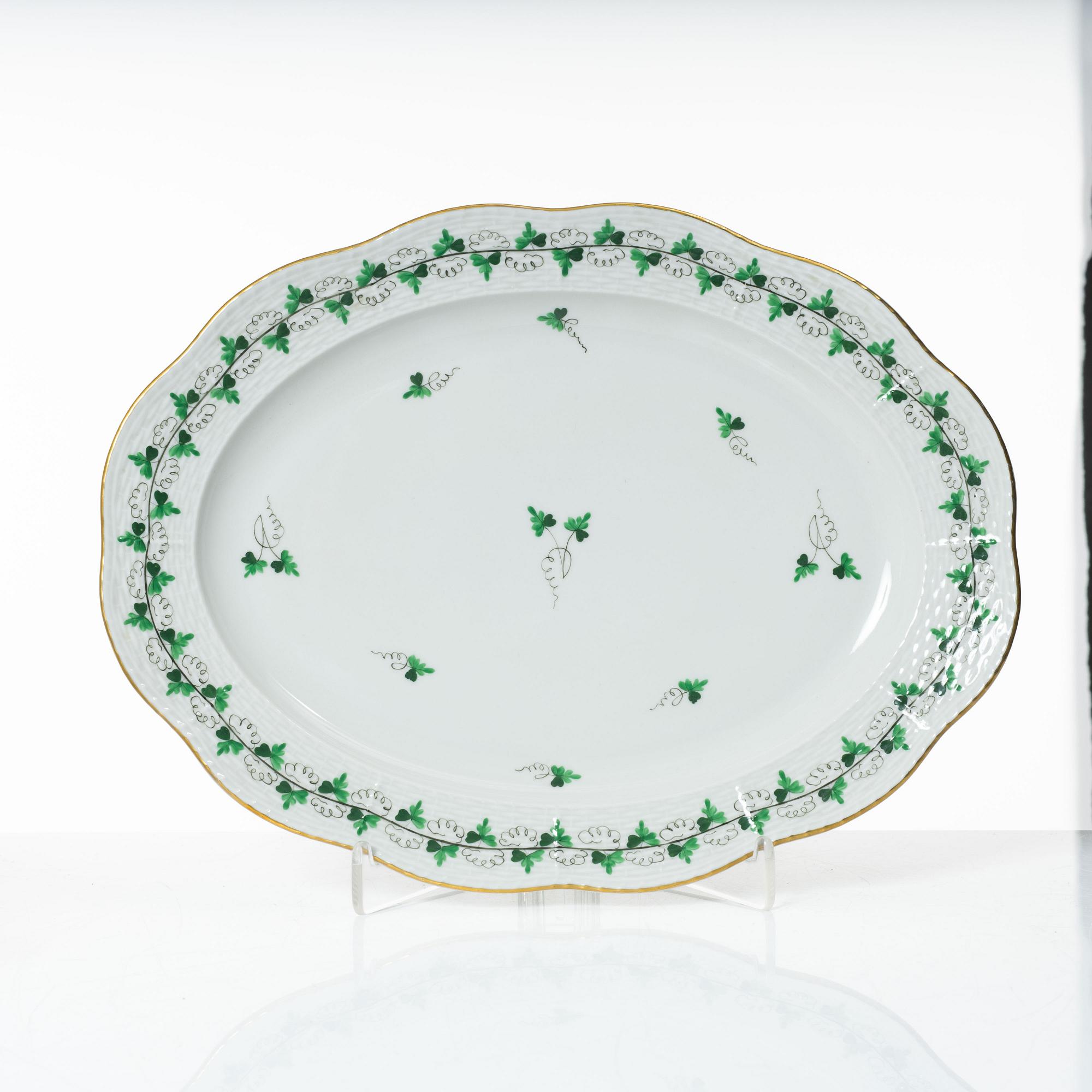 A 42-piece 'Chinese Bouquet' porcelain service and six 'Waldstein rose' coffee cups with saucers, Herend, Hungary.