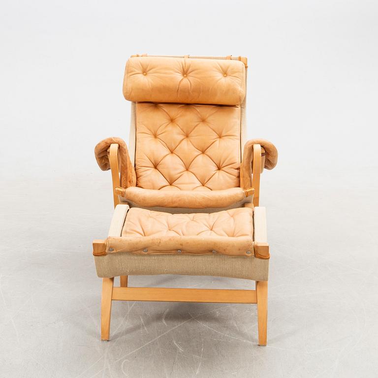 Bruno Mathsson, Armchair with footstool, "Pernilla", DUX, late 20th century.