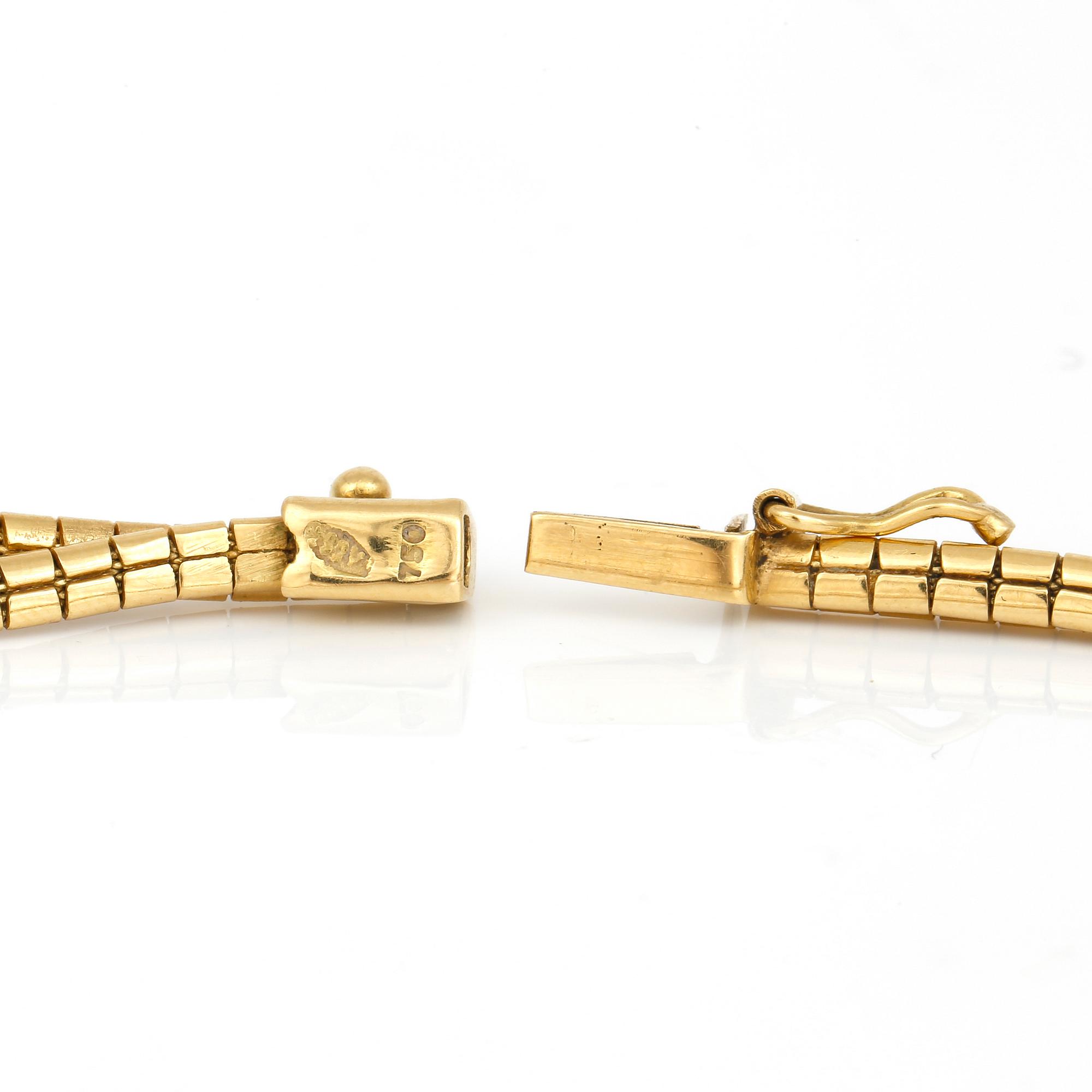 COLLIER, 18k guld, vikt ca 37 gram.