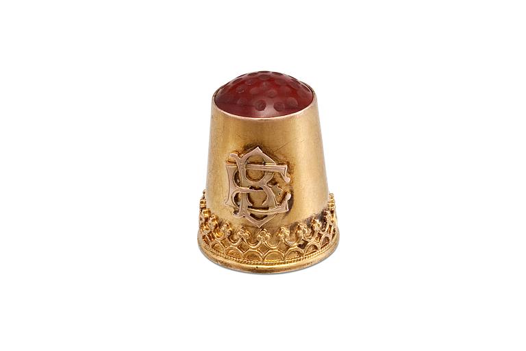 A THIMBLE.