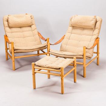 BROR BOIJE, A pair of 'Junker' easy chairs and an ottoman for Dux, Sweden, latter half of the 20th Century.