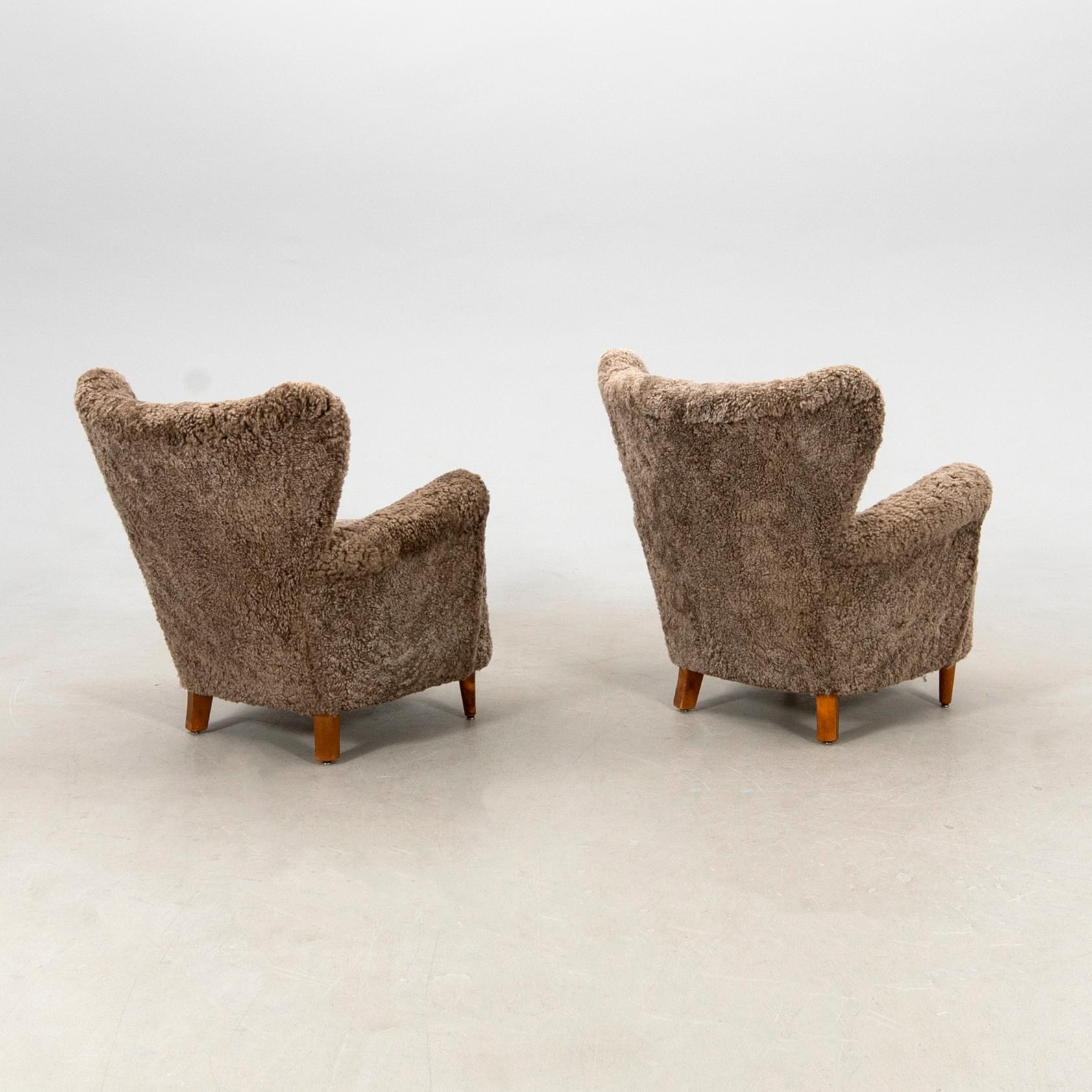 Armchairs, a pair from the 1940s.