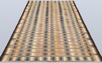 A Persian Nomad Kilim carpet, ca 286 x 155 cm.