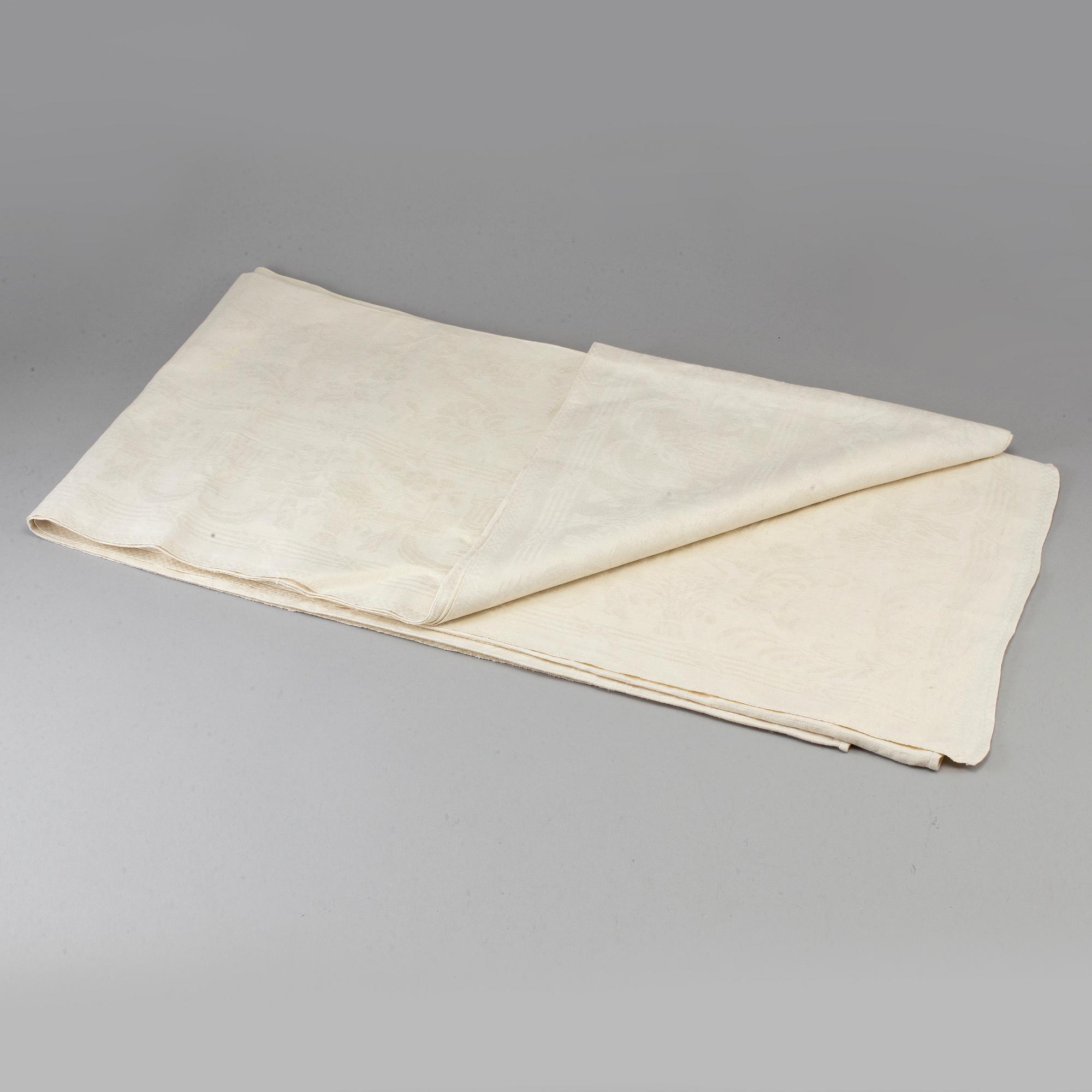 A TABLE CLOTH, linen damask, "Ymnighetshornet", ca 294 x 148 cm, signed C.W. T:tORP SVERIGE.