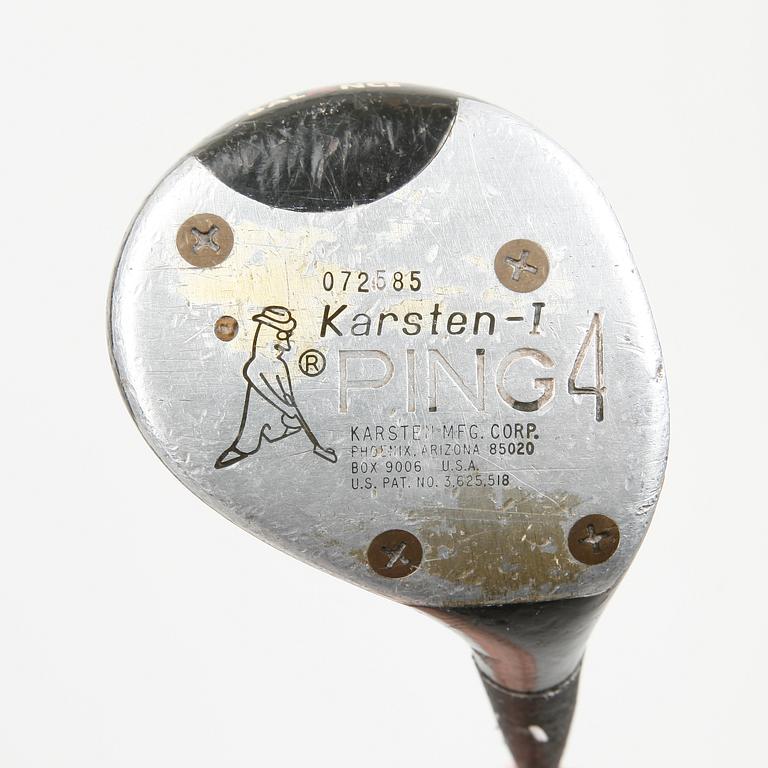 MULBERRY, a green leather golf bag with golf clubs.