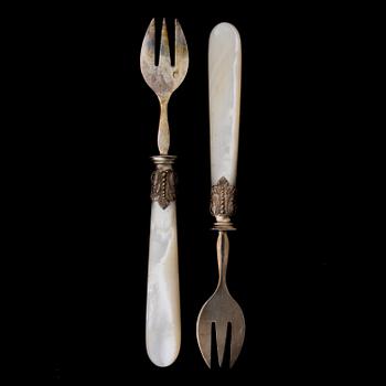 A SET OF TEN 19TH CENTURY FRENCH SILVER OYSTER FORKS, marked Charles Marseille, Paris.