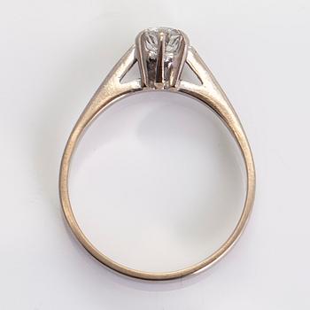 An 18K white gold solitaire ring, with a brilliant-cut diamond approx. 0.46 ct. Finnish import marks.