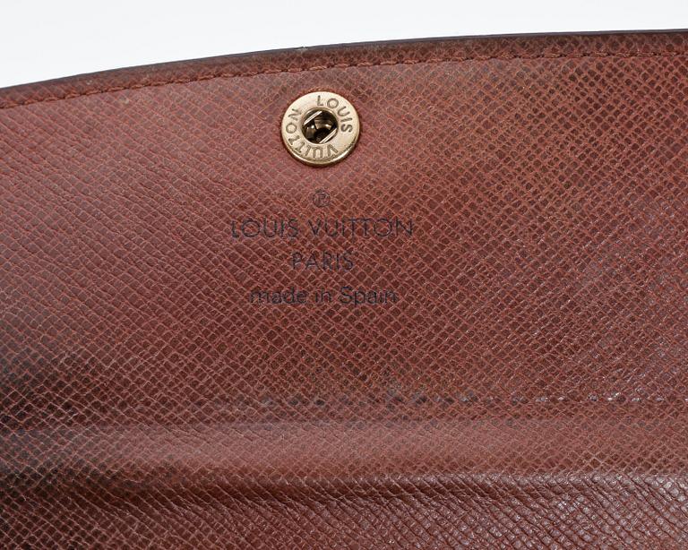A monogam canvas purse by Louis Vuitton, model "M61735".
