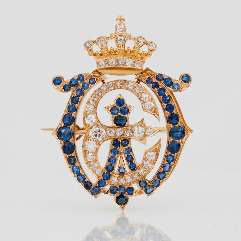 A Dutch late 19th century bracelet/brooch set with old-cut diamonds and sapphires.