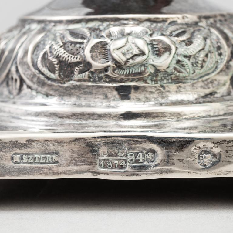 A pair of silver Sabbath candlesticks, Maker M. Sztern, Warsaw, Poland. Assayer Josef Sosnkowski, 1864. Weight 833 g.