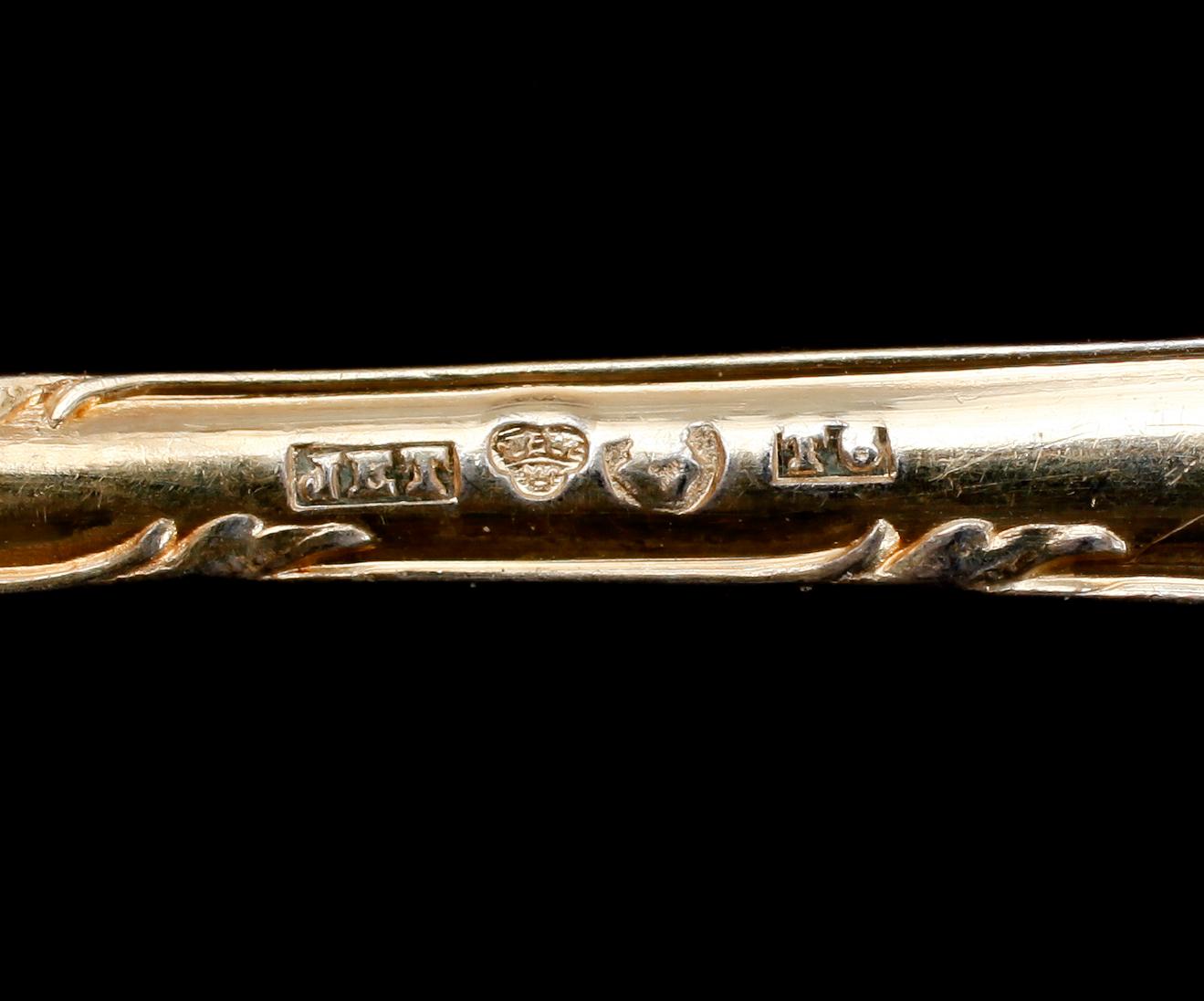 KAFFESKEDAR, 12 st, förgyllt silver, 1897. Vikt ca 159 g.
