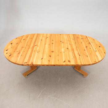 A pine dining table, 1970s.