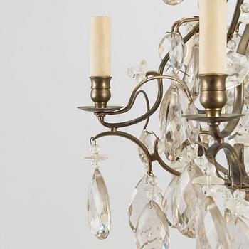 A rococo style chandelier, early 20th century.