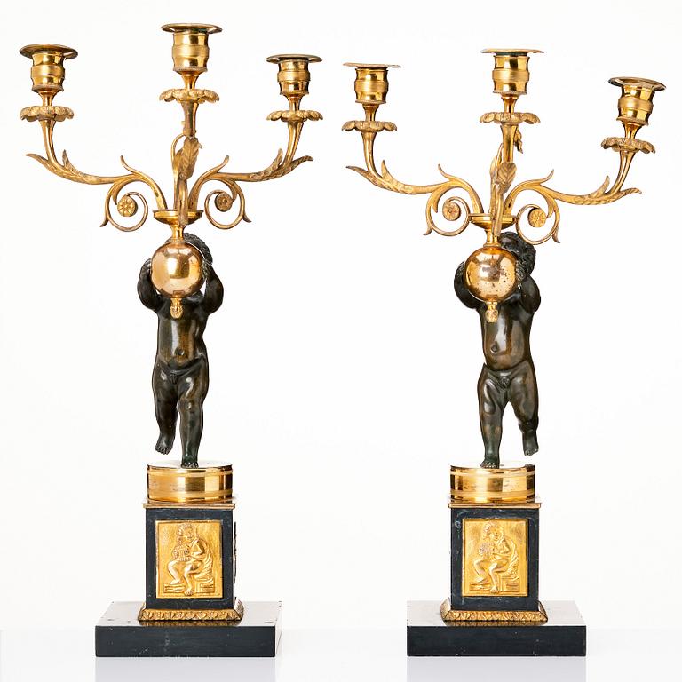 A pair of late Gustavian candelabra.