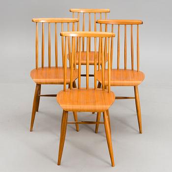 A set of four 20th century chairs.