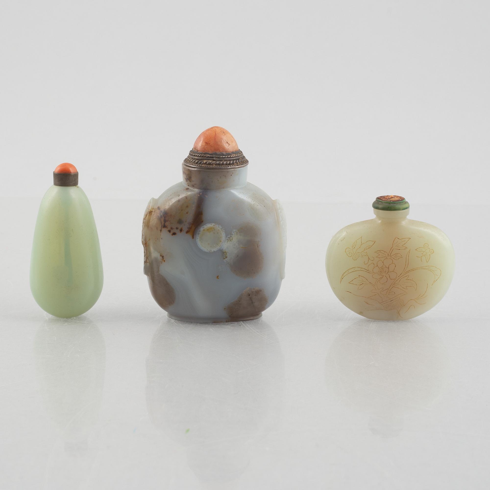 A group of three Chinese stone snuffbottles, 20th century.