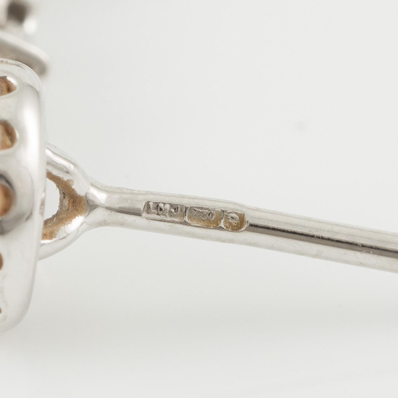Earrings 18K white gold with brilliant-cut diamonds.