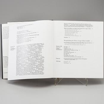 A set of 5 watch books.