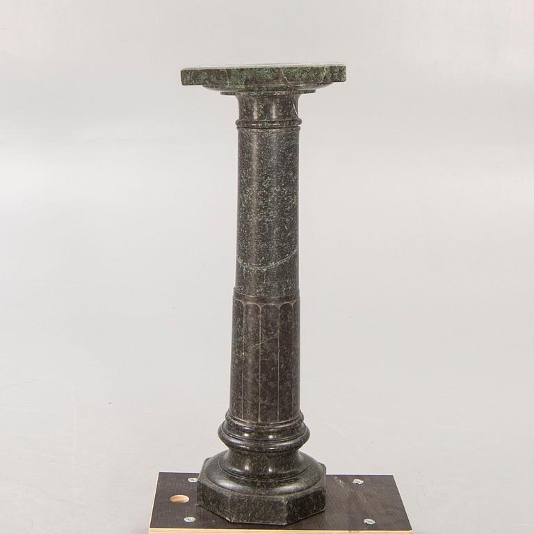 An early 1900s marble pedestal.