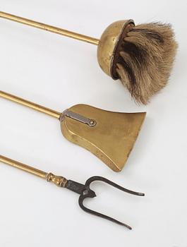 A set of fireplace brass utensils, 18th century.