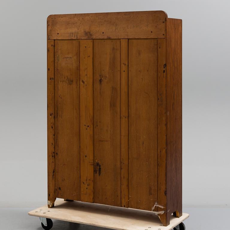 A early 20th century Jugend Cabinet veneered with oak.
