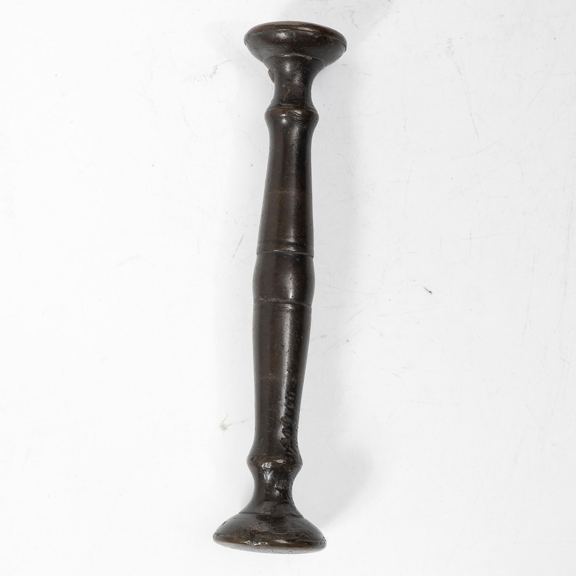Mortar and pestle, dated 1600. Baroque.