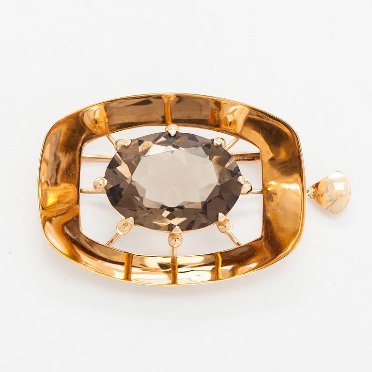 Helge Narsakka, riipus/rintaneula, 14K kultaa, savukvartsi, 1965.