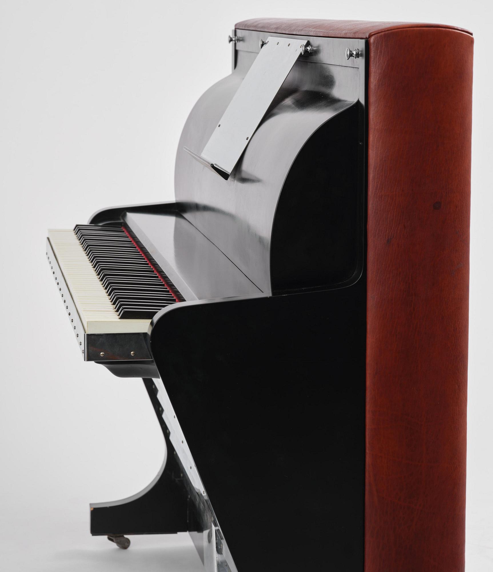 Poul Henningsen, a "PH Upright Piano", executed by Andreas Christensen, Denmark, 1940s.