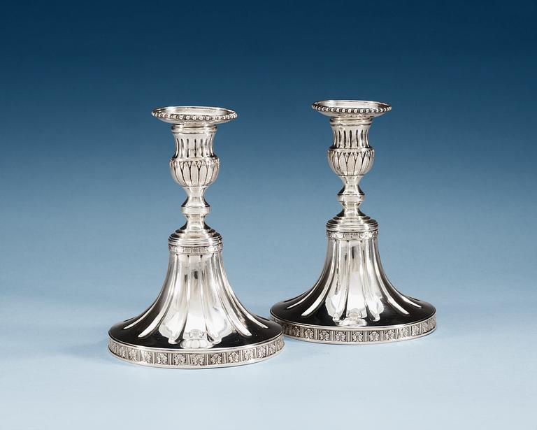 A PAIR OF SWEDISH SILVER CANDLESTICKS, Makers mark of Arvid Floberg, Stockholm 1780.