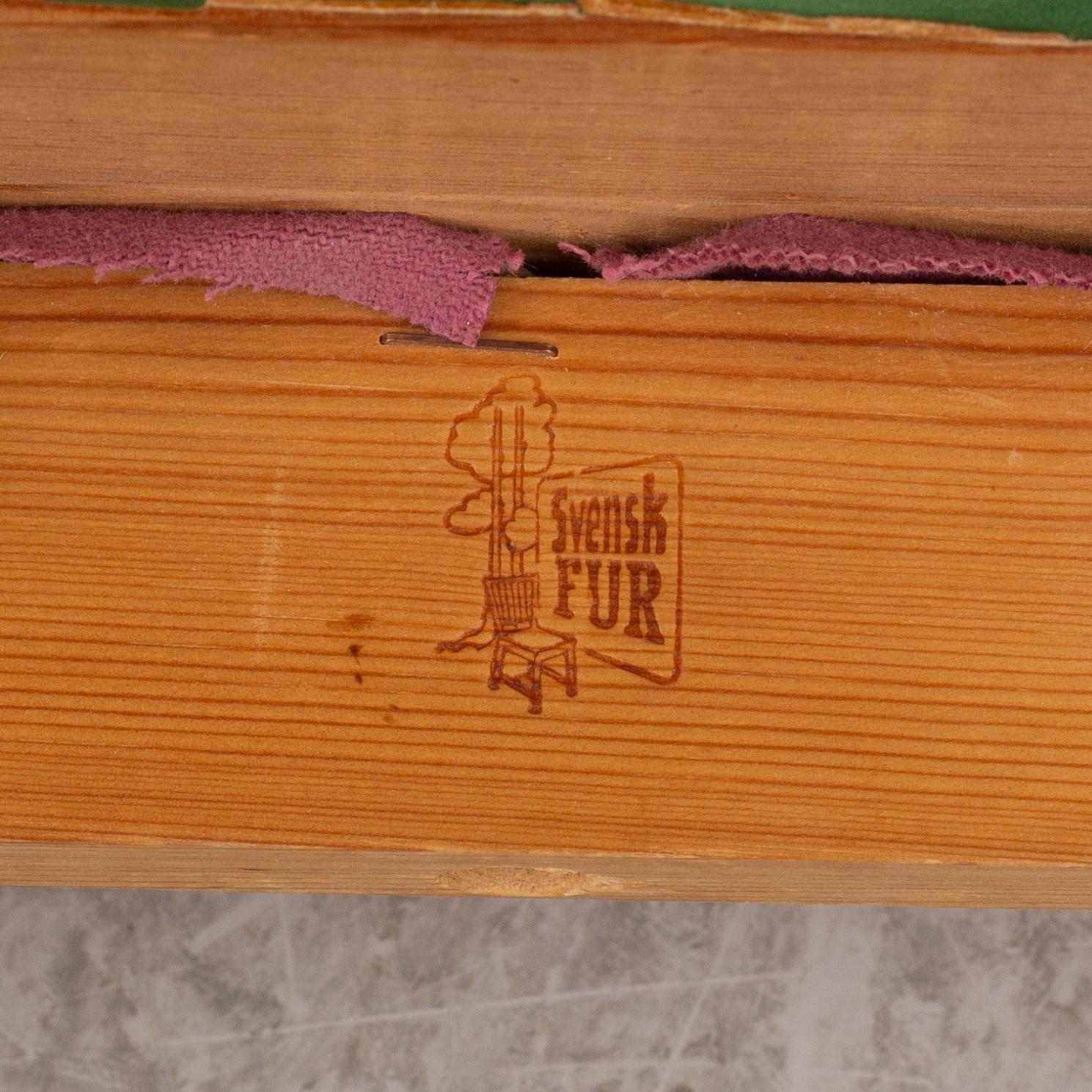 Carl Malmsten, dining table and four chairs, including Svensk Fur, second half of the 20th century.